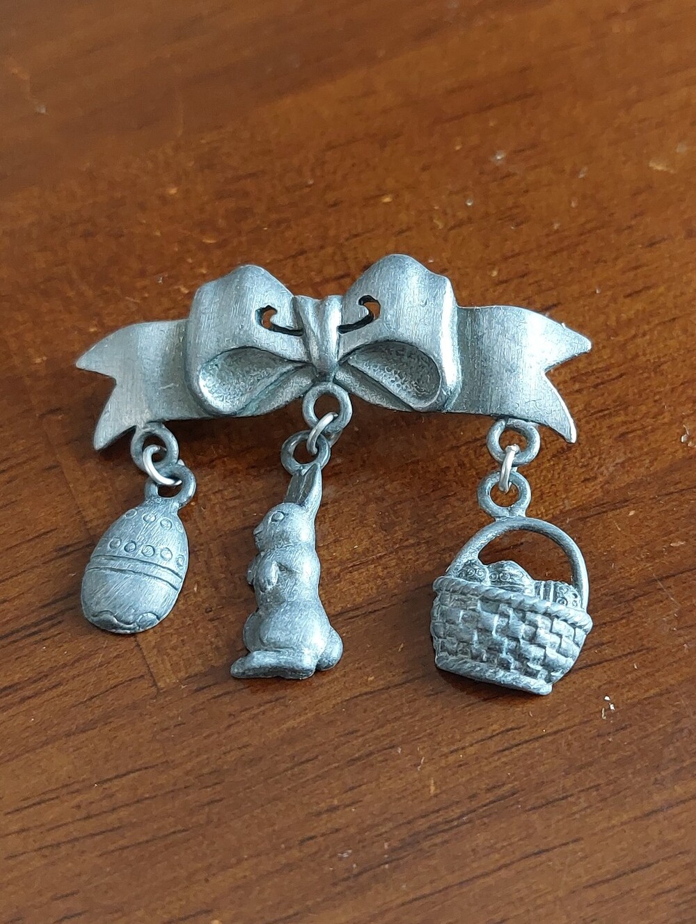 Whimsical Pewter Easter Parade Ribbon Pin 3 Dangling Charms Egg Bunny Basket